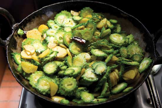 In Bangladesh, bitter melon is typically stir-fried with garlic, potatoes and chilies.